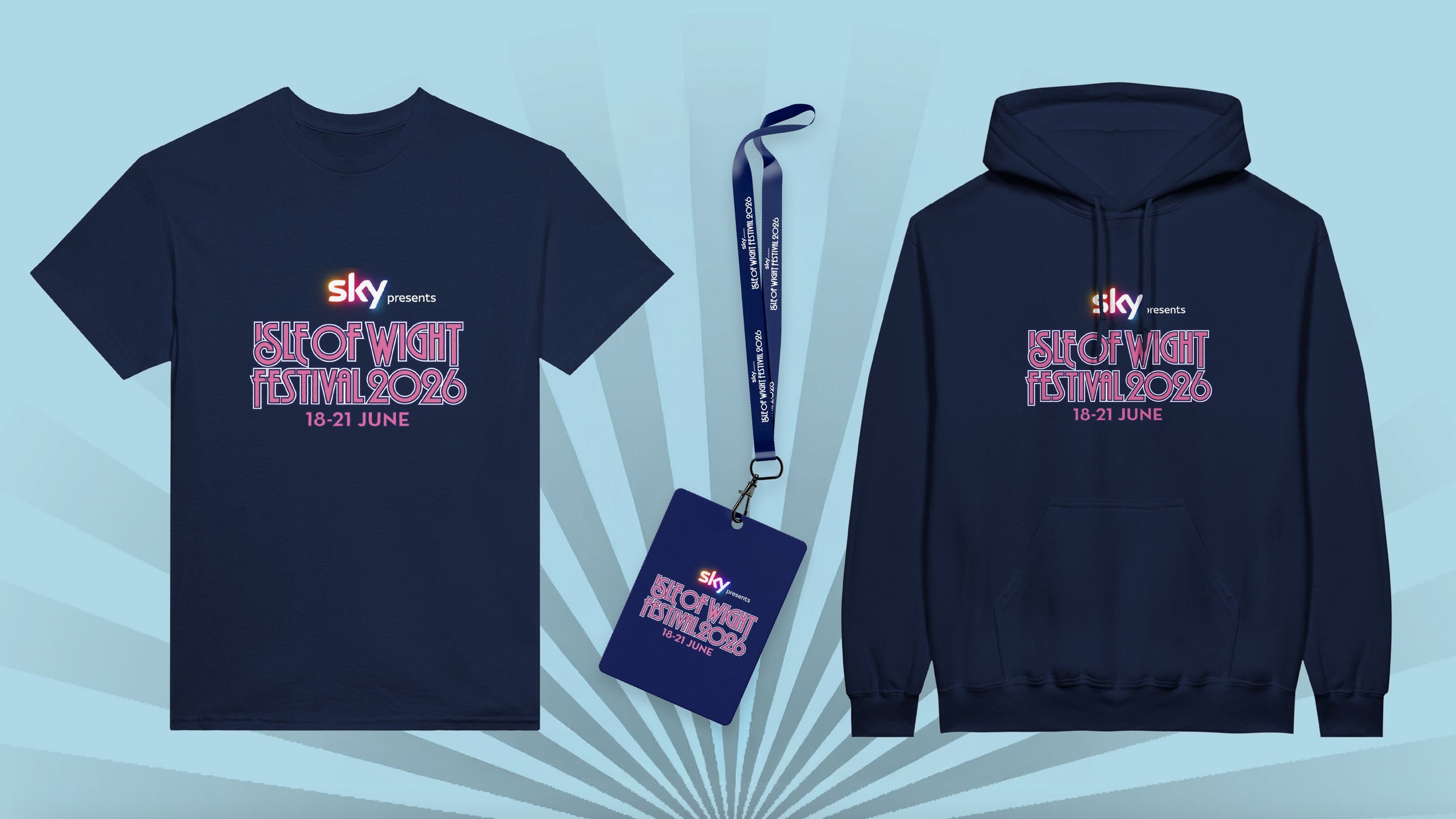 Navy blue Isle of Wight Festival 2024 merchandise: a T-shirt, lanyard with pass, and hoodie, each featuring pink and white festival text and dates on a light blue background.