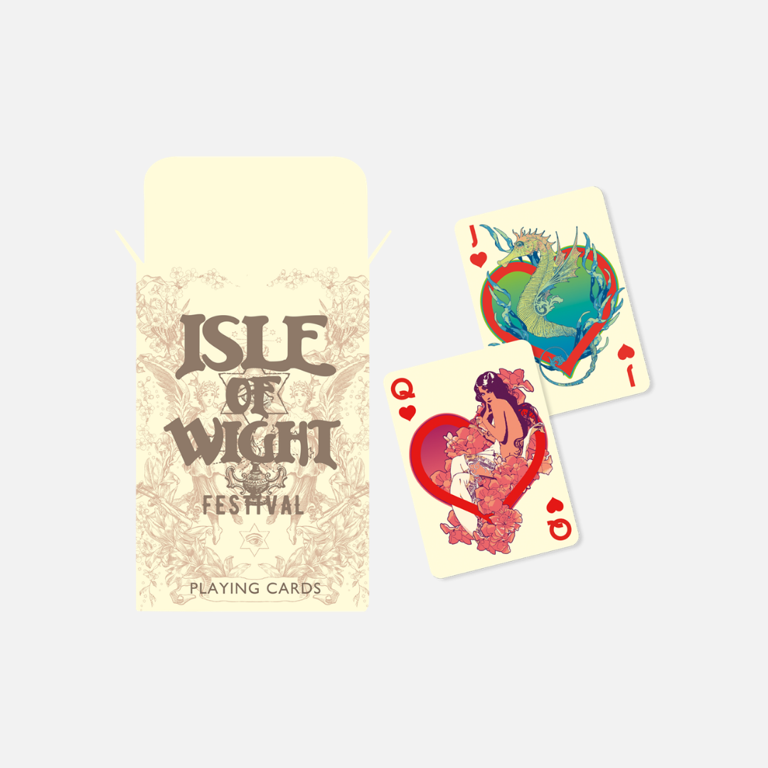 An open box of Isle of Wight Festival 2025 Playing Cards with ornate, vintage-style text and two cards featuring illustrations of a seahorse and a woman surrounded by flowers.
