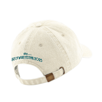 The Isle of Wight Festival 2025 Cap Vintage Sand by 2025 features embroidered teal text on the back reading SKY PRESENTS ISLE OF WIGHT FESTIVAL 2025 above an adjustable strap with a metal buckle—ideal for festival style.