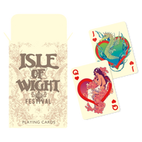 A decorative box labeled Isle of Wight Festival 2025 Playing Cards from 2025 is displayed beside two cards: the ace of hearts with a dragon and globe, and the queen of hearts showing a woman with flowers.